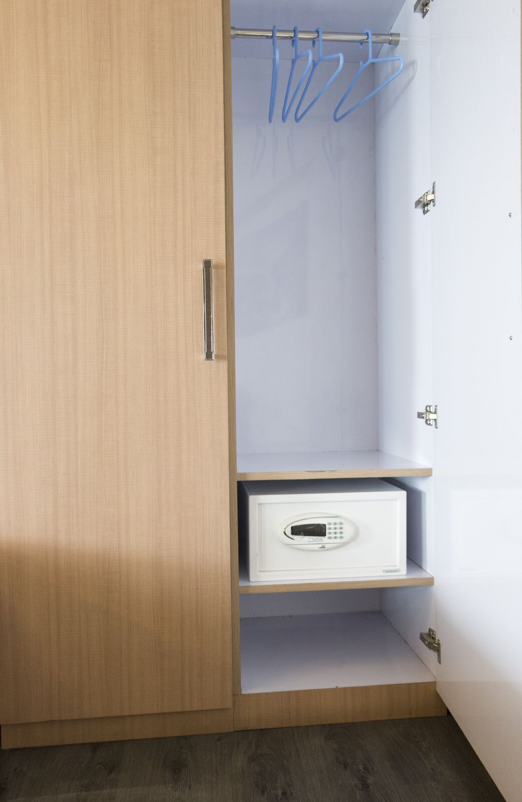 The built-in wardrobe with its safe vault.